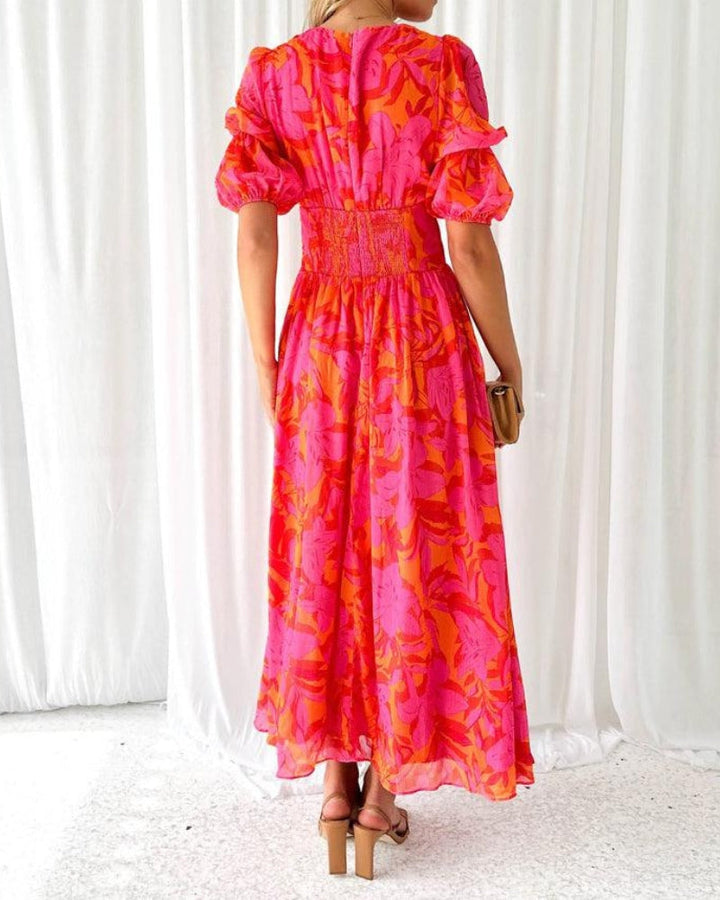 Stylish long maxi dress for women featuring a V-neck, elegant puff sleeves, and flowy silhouette.