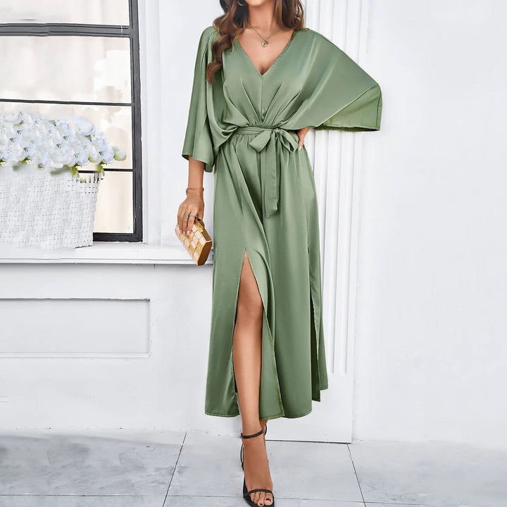Versatile women's V-neck dress, ideal for spring & summer. Flowy fabric & comfortable fit for daytime or evening.