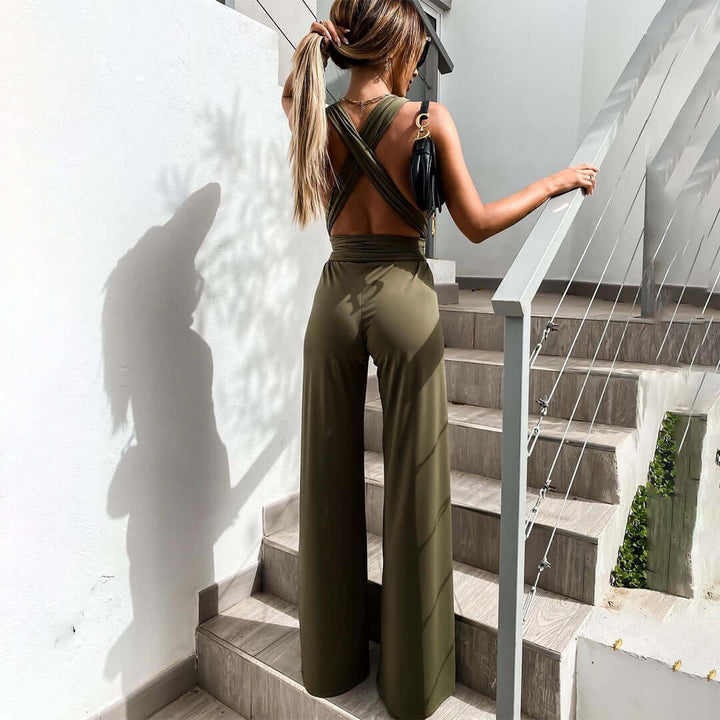 Chic women's polyester jumpsuit with a flattering V-neck & wide-leg cut for formal events.
