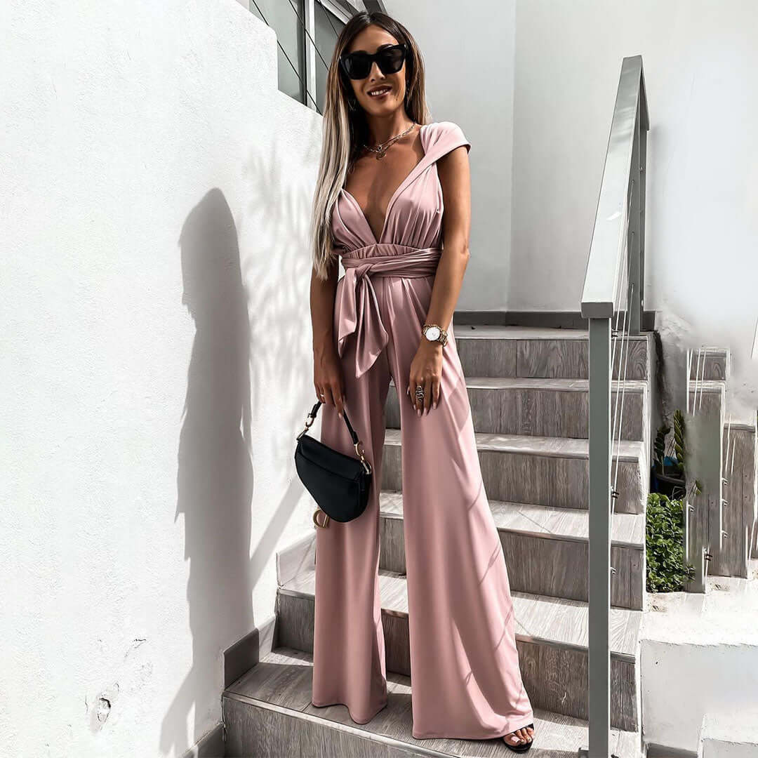 Sleek V-neck wide-leg women's jumpsuit, a perfect sophisticated outfit for any formal party.