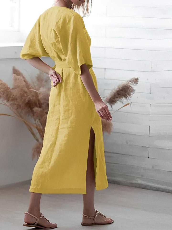 Women's versatile elegant wrap dress, a V-neck midi style with an adjustable belt, ideal for various occasions.