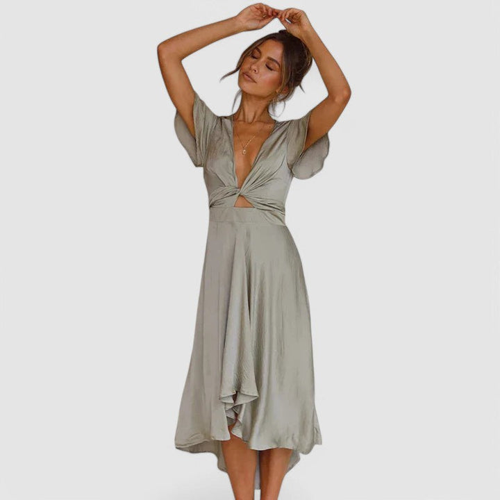 Stylish Women's Wrap Midi Dress for formal occasions. V-neck design, perfect as a cocktail or party dress.