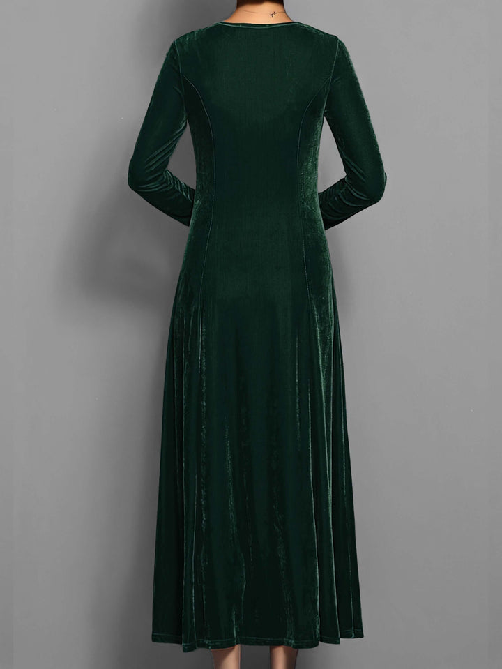 Luxurious and comfortable women's velvet midi dress, an elegant long sleeve design for formal parties and evening wear.