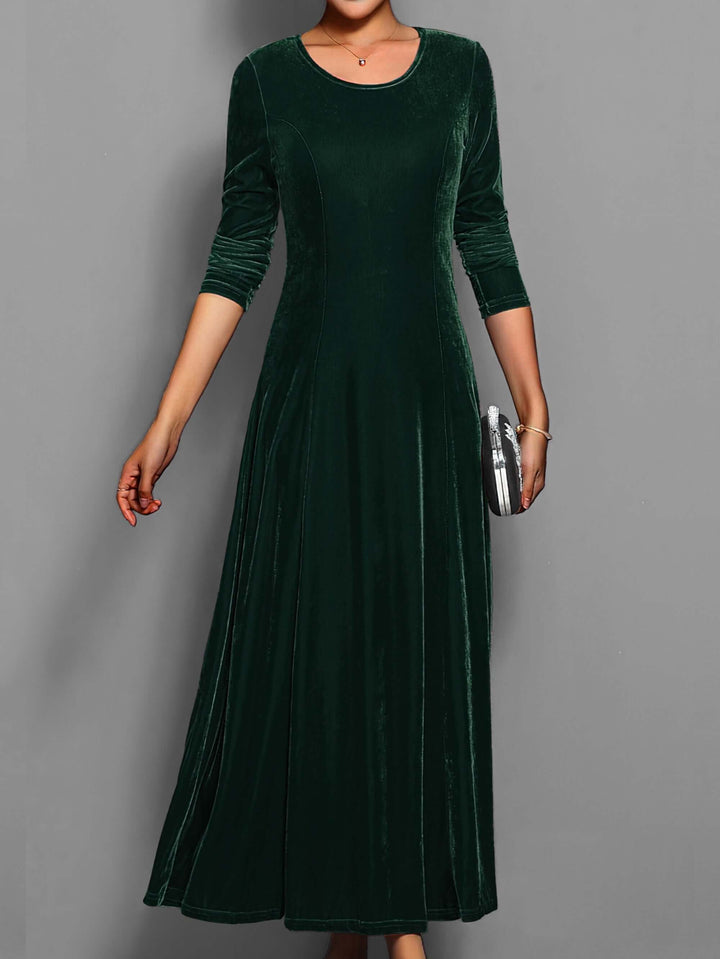 Sophisticated women's long sleeve velvet midi gown, a perfect elegant formal party dress for special occasions.