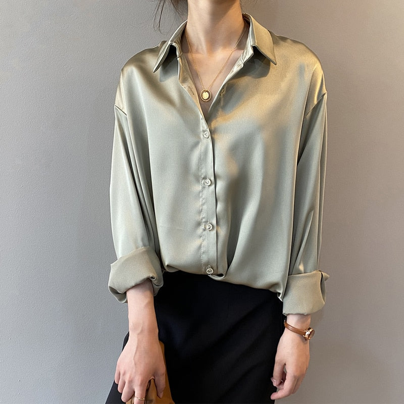 Women's tailored silk blouse, elegant vintage design. A luxury fashion top for discerning style.