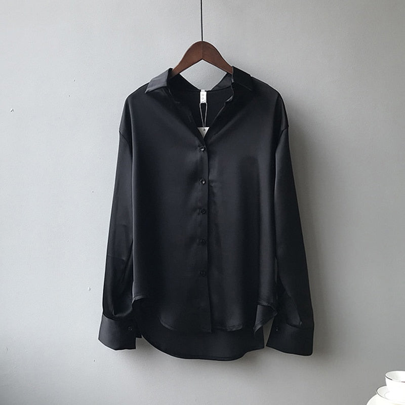 Vintage-inspired women's silk blouse, chic tailored design for a sophisticated & elegant look. Fashion top.