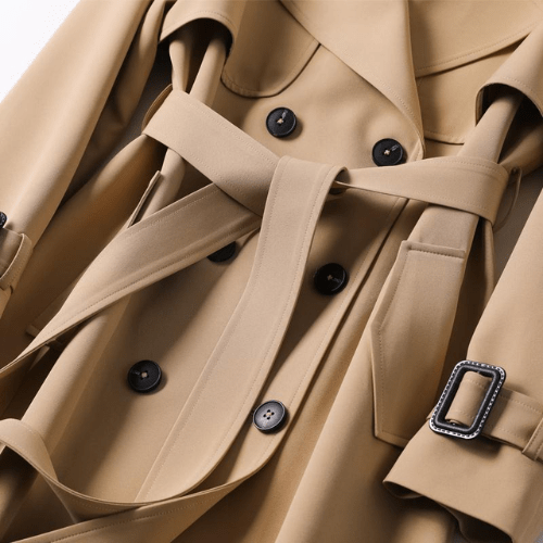 Elegant women's double-breasted trench coat in khaki, a timeless classic for fall & winter fashion.