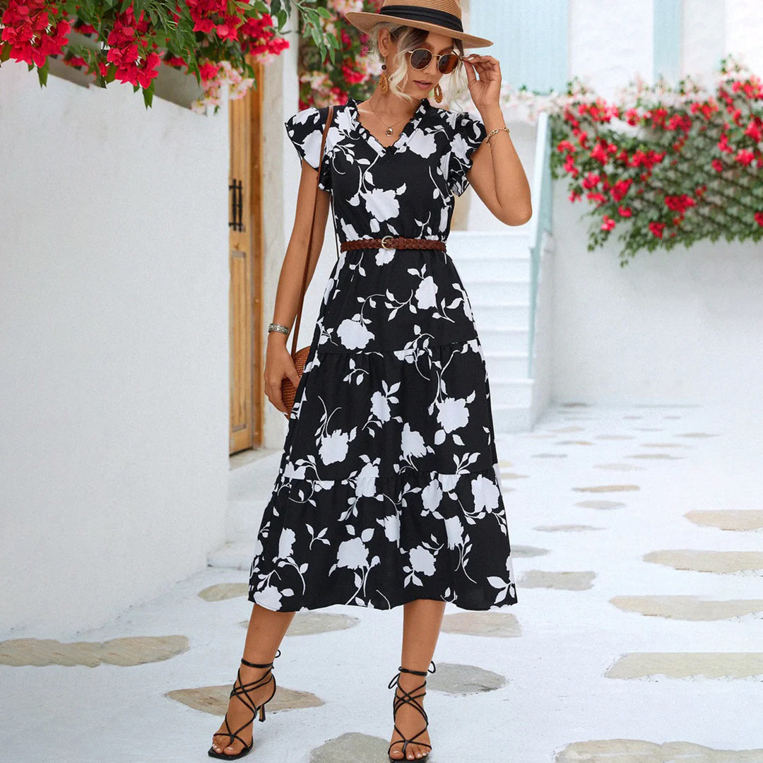 Elegant women's vintage V-neck midi dress, perfect for summer. Comfortable and stylish for casual or party wear.