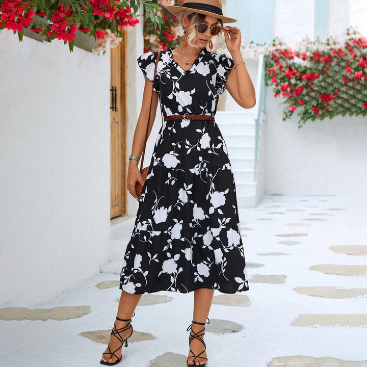 Elegant women's vintage V-neck midi dress, perfect for summer. Comfortable and stylish for casual or party wear.