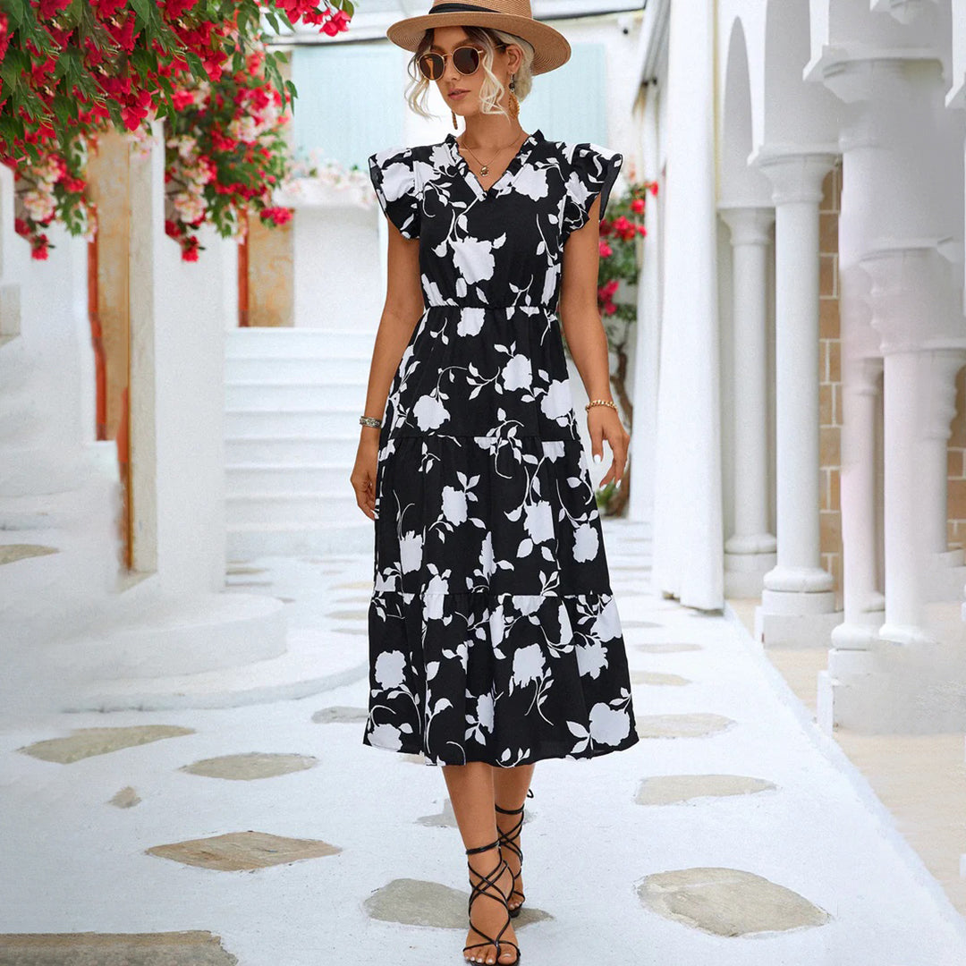 Black floral vintage V-neck midi dress for women. Elegant summer style, comfortable and versatile for parties.