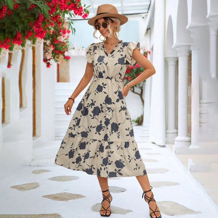 Floral vintage V-neck midi dress for women. Elegant summer fashion, comfortable & versatile for parties or casual.