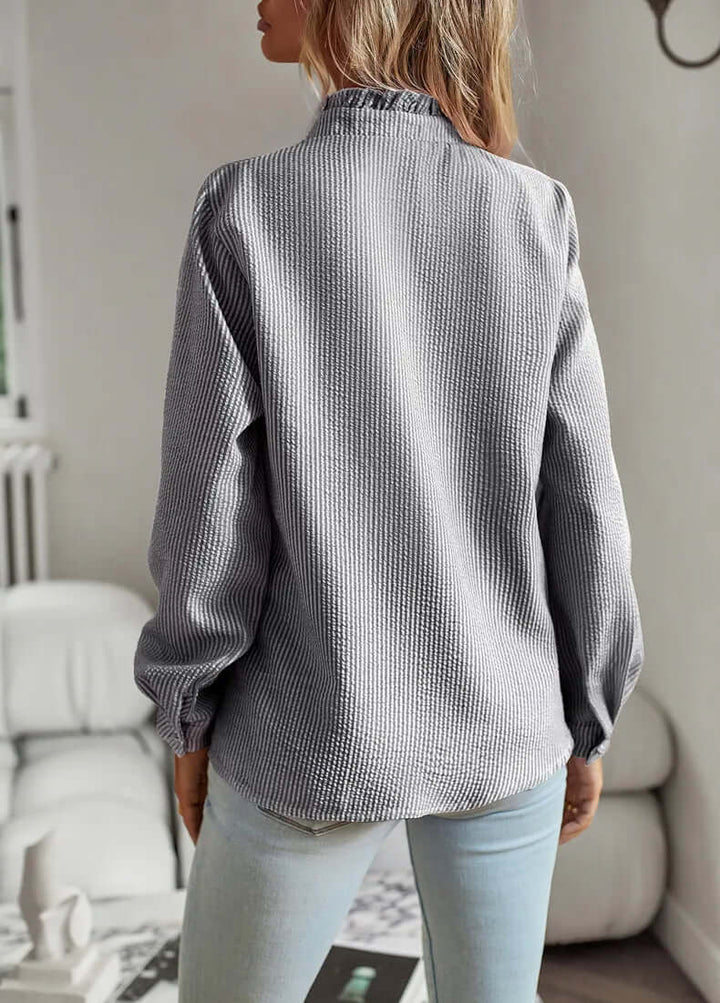 Comfortable women's elegant cotton top. Short-sleeve, soft, breathable fabric for relaxed everyday summer fashion.
