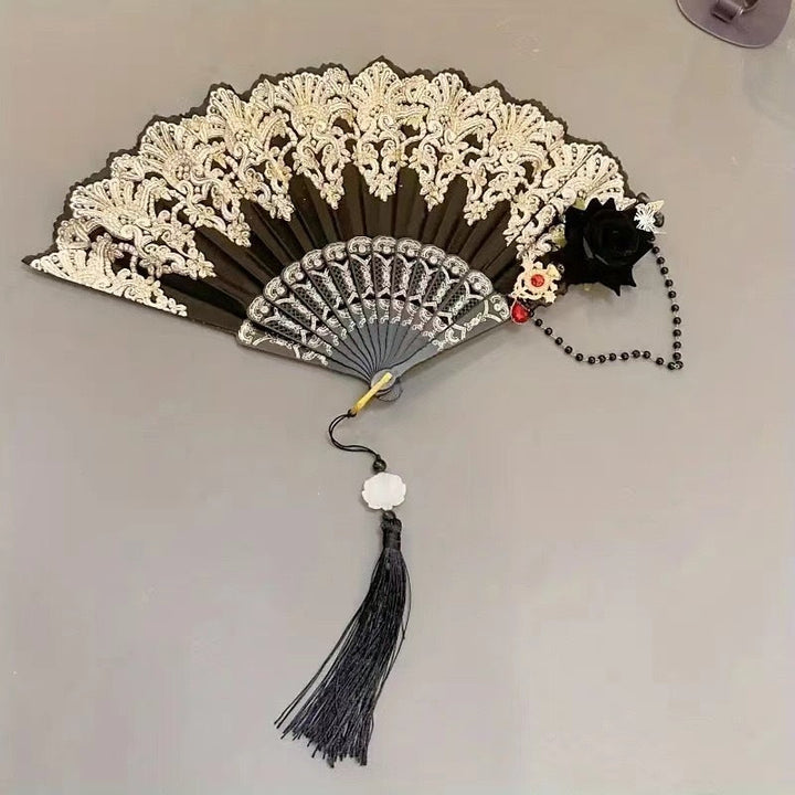 Elegant women's white lace folding fan for weddings & special occasions. Delicate handheld accessory.