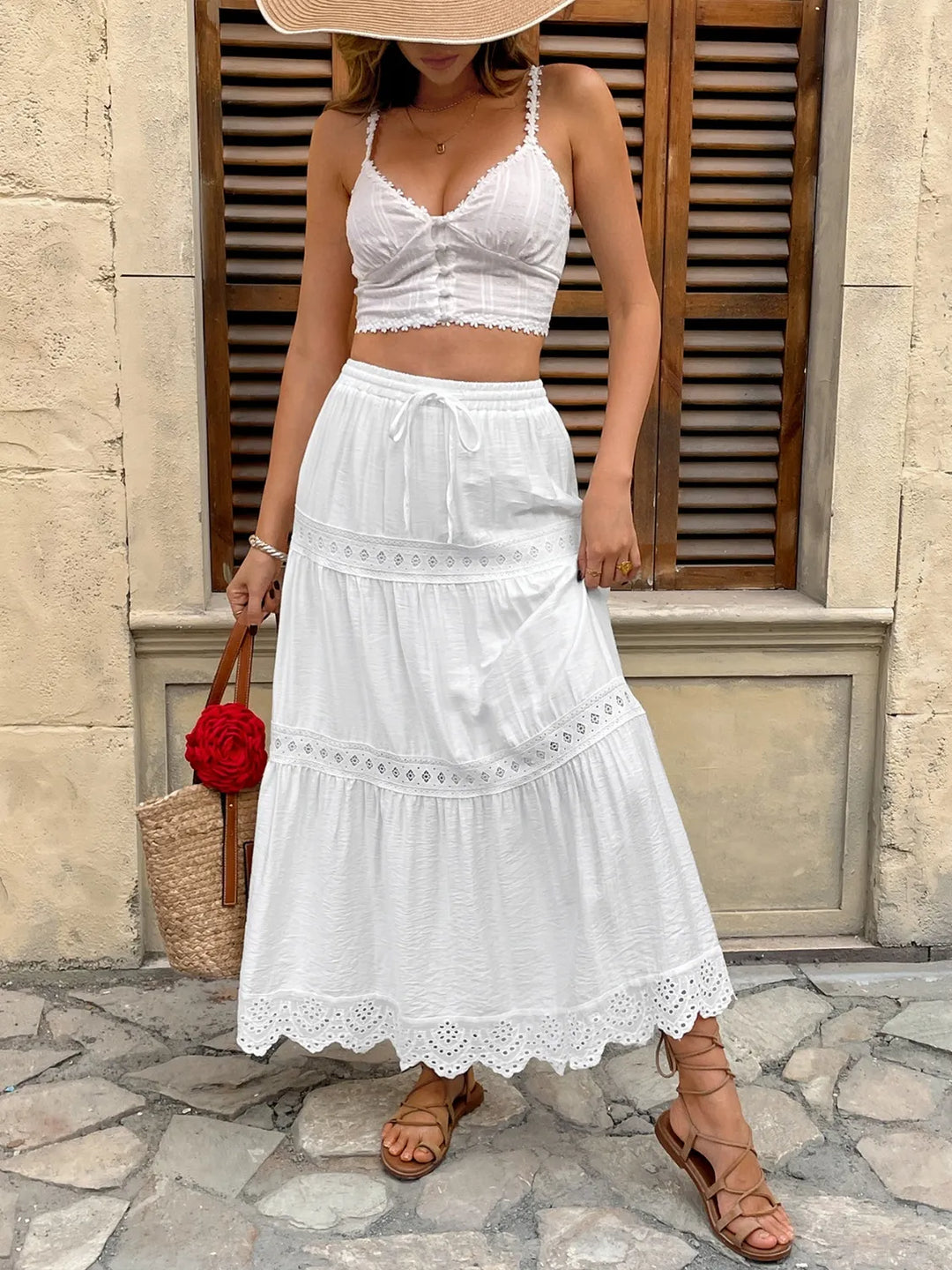 Flowy women's white lace maxi skirt with elegant tiered design, perfect for summer vacations & casual style.