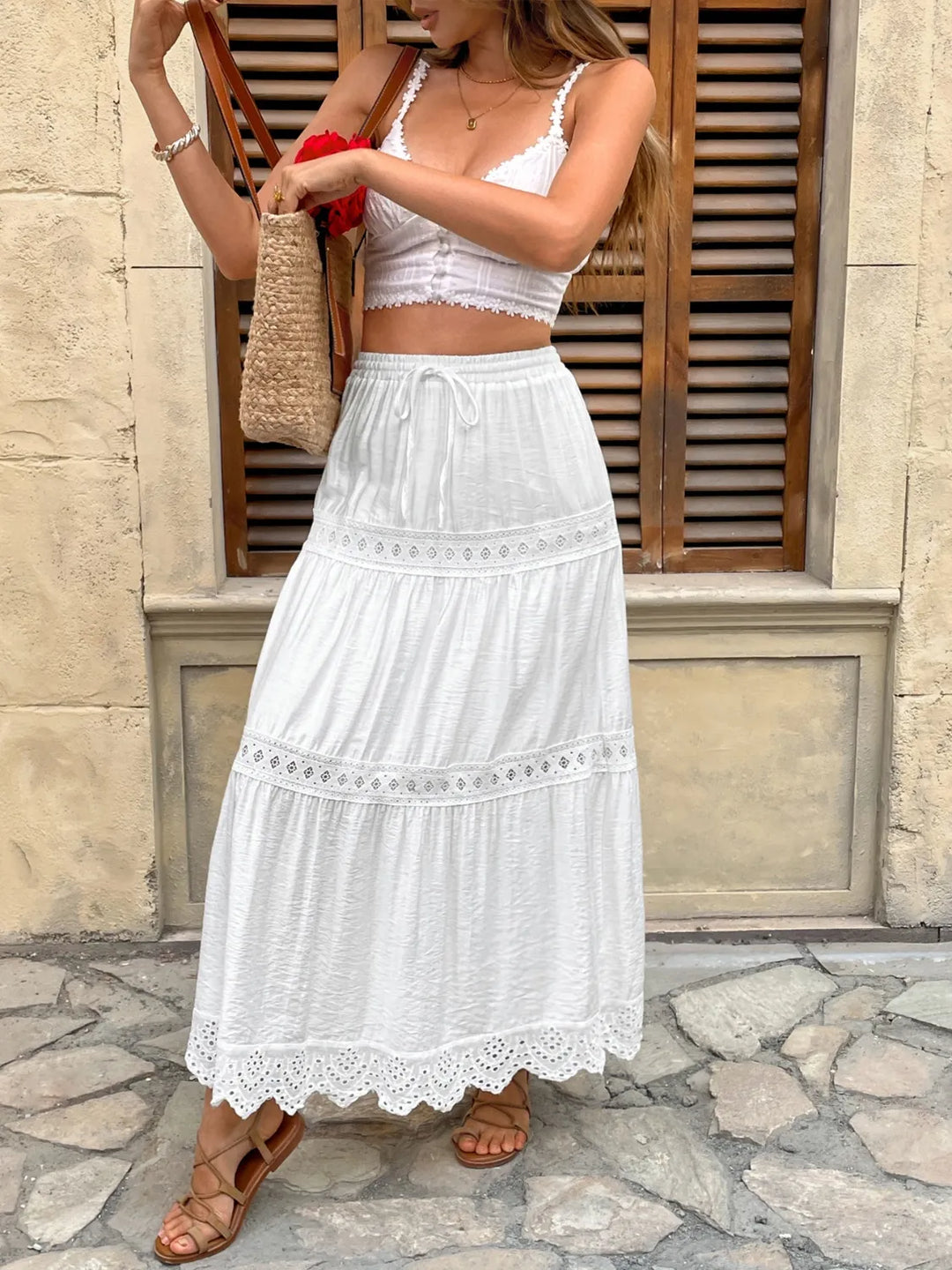 Elegant white lace maxi skirt for women, flowy & long, ideal for summer, bohemian, or vacation wear.
