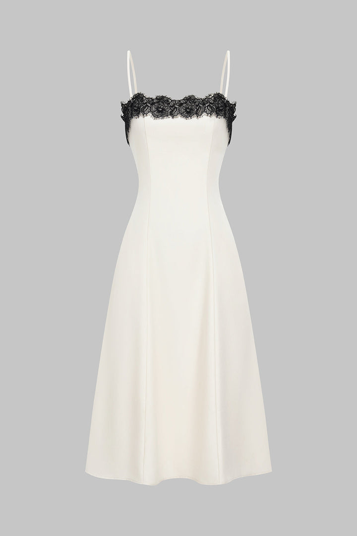 Elegant women's white midi dress with sophisticated black lace detail, perfect for evening events & special occasions.
