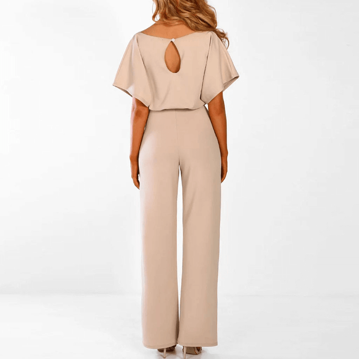 Stylish one-piece women's wide leg jumpsuit with an elegant belt, perfect for fashion-forward looks.