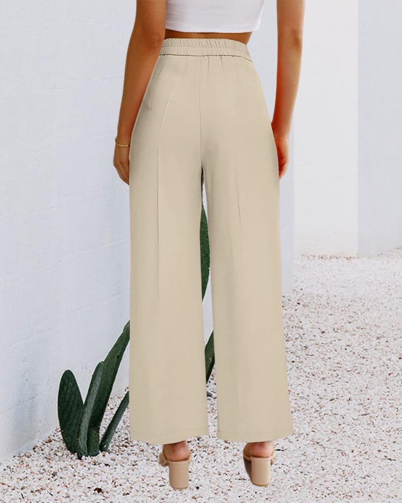 Soft, comfortable women's wide-leg trousers with a high-waist fit, suitable for all-day elegant wear.