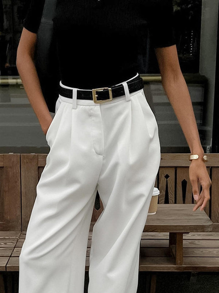 High-waist pleated wide-leg trousers for women, comfortable & stylish formal/casual wear.
