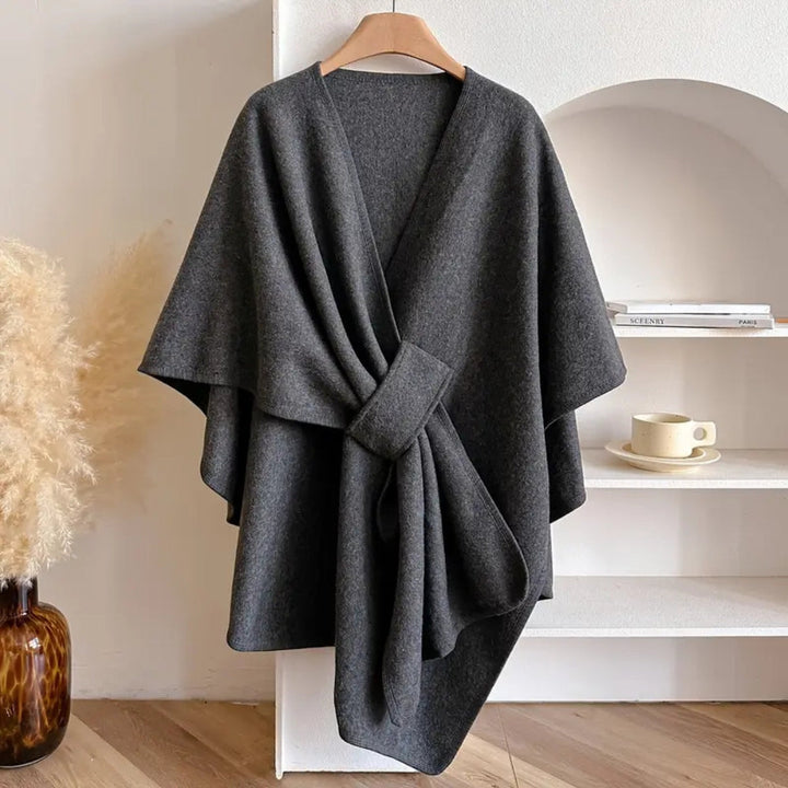 Chic women's windproof poncho shawl coat, elegant and warm for fall/winter outerwear fashion.