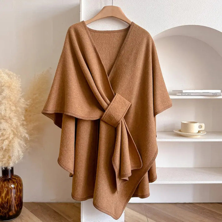Elegant women's fall/winter outerwear: a stylish windproof poncho shawl coat in cozy microfiber.
