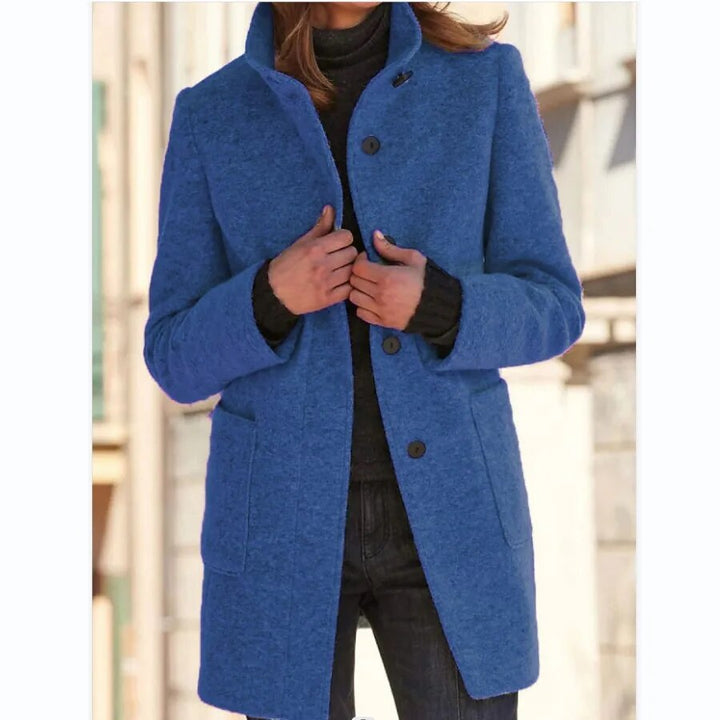 Stylish women's buttoned winter overcoat with a sophisticated standing collar, perfect for elegant cold-weather fashion.