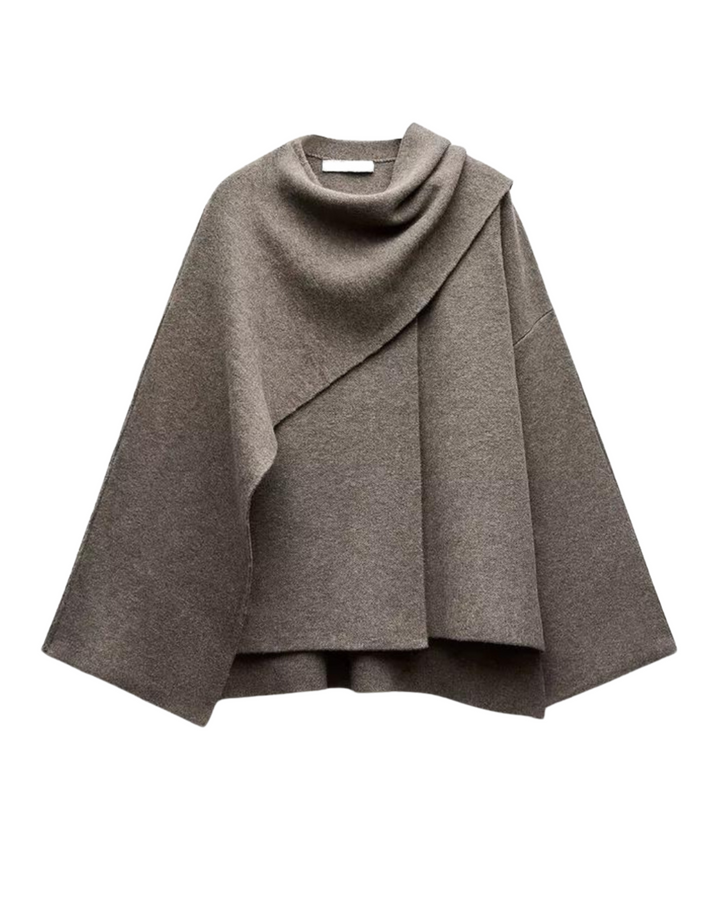 Elegant women's winter poncho, a warm & stylish asymmetrical wrap, perfect for fall fashion.