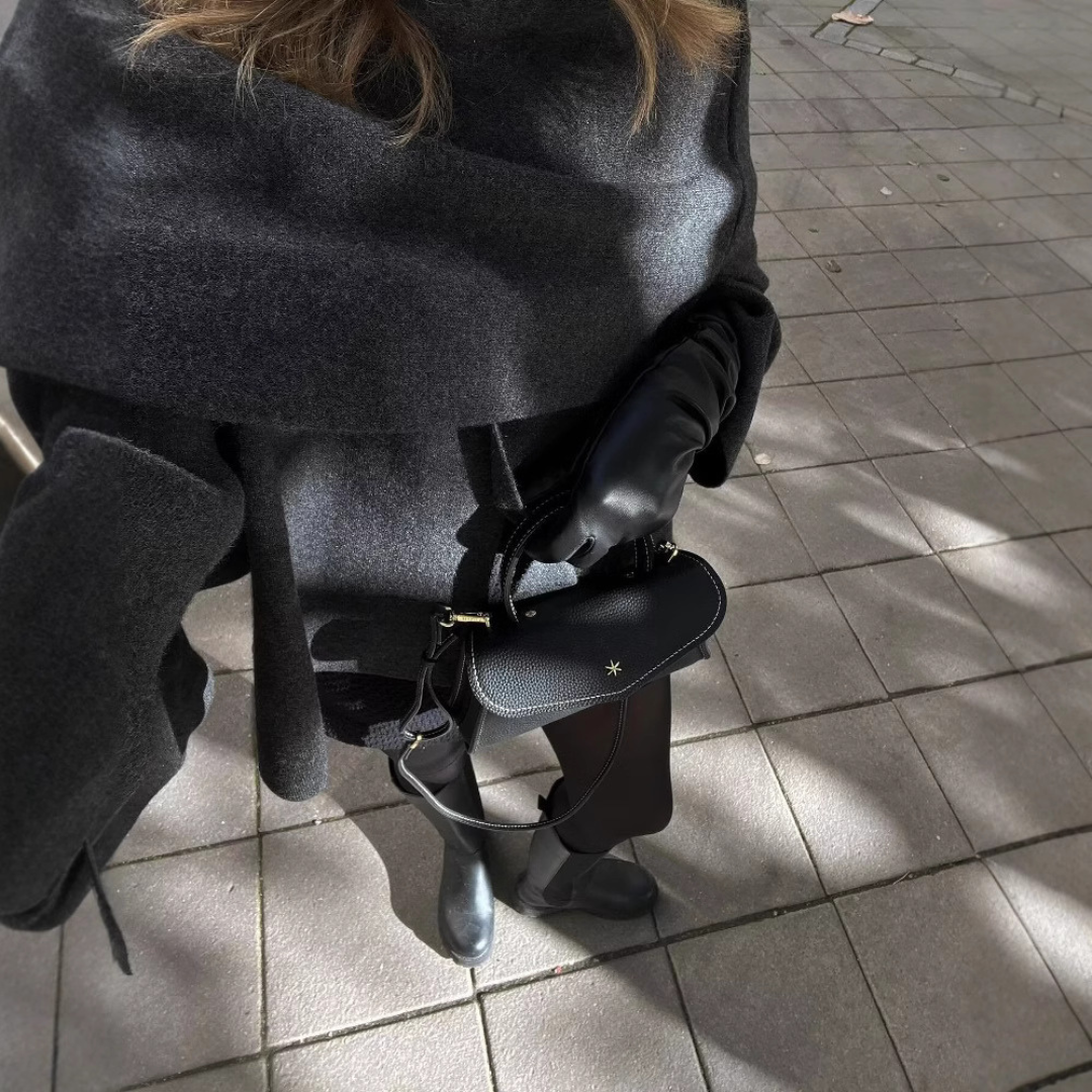 Cozy oversized women's winter poncho, a stylish warm wrap & essential fashion accessory.