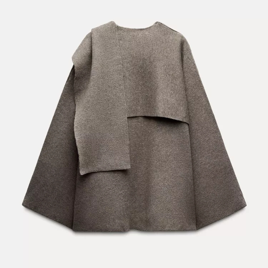Plush warm women's winter poncho, stylish elegant outerwear for comfort & a chic look.
