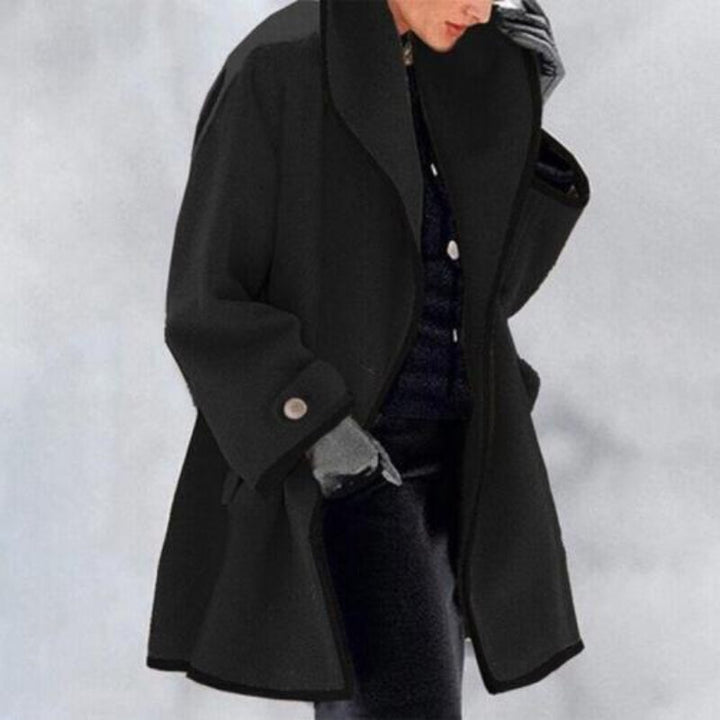 Women's wool blend double button long winter trench coat. Elegant outerwear for cold weather.