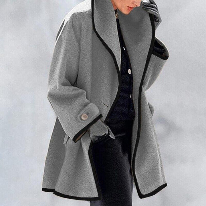 Stylish women's wool blend double breasted trench coat. Elegant long outerwear for fall & winter fashion.