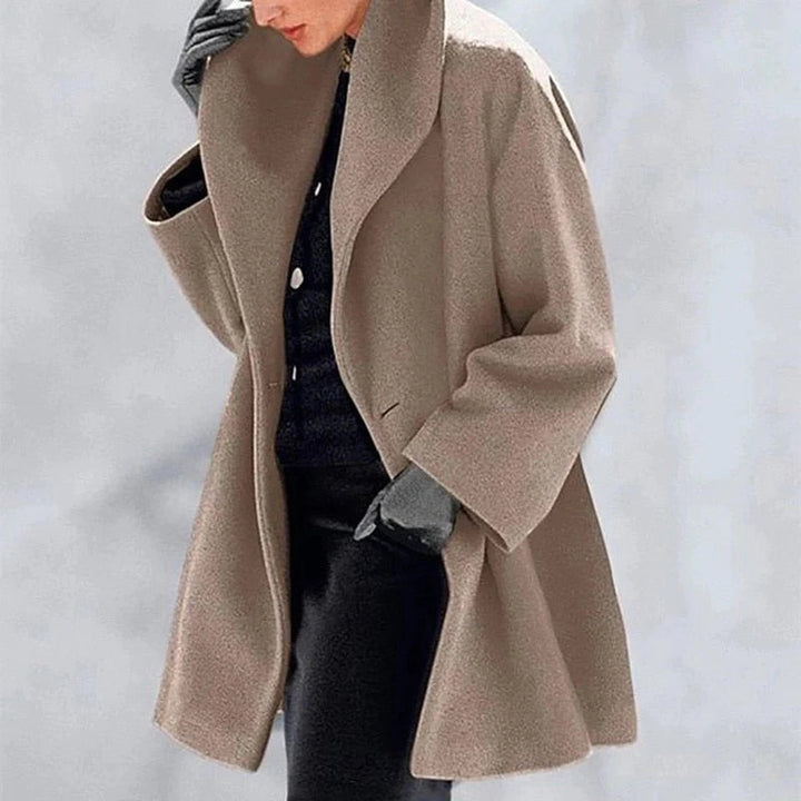 Stylish elegant women's wool jacket. Hip-length winter outerwear for a sophisticated & warm fall look.