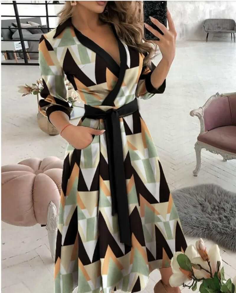 Chic women's wrap midi dress featuring a V-neck and tie waist, suitable for formal or casual elegance.