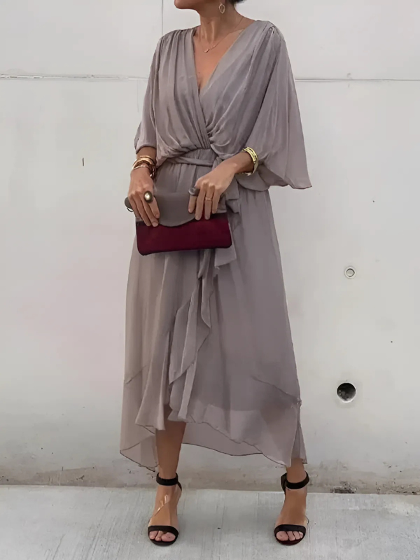 Comfortable & elegant women's wrap midi dress, perfect for a chic and versatile look.