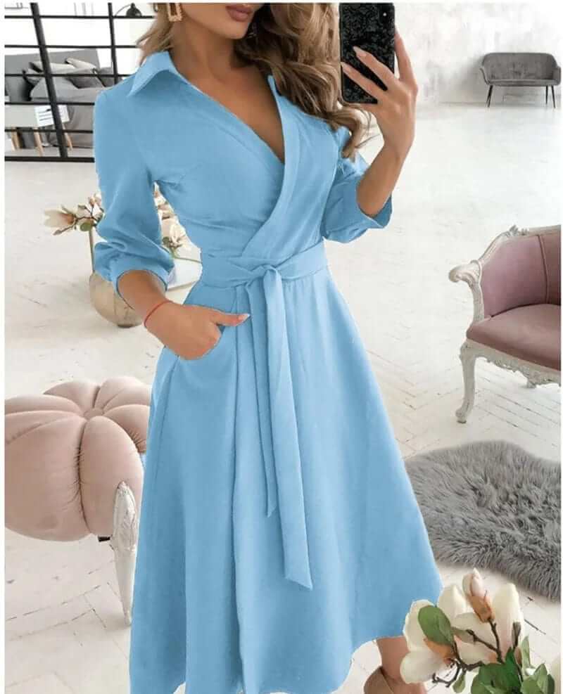Flattering women's wrap midi dress, designed for an elegant look, ideal as a formal or cocktail dress.