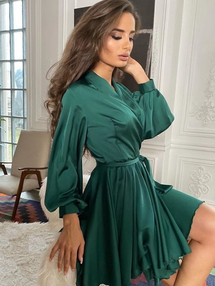 Brown elegant women's wrap mini dress, ideal as a cocktail or party dress for evening wear.