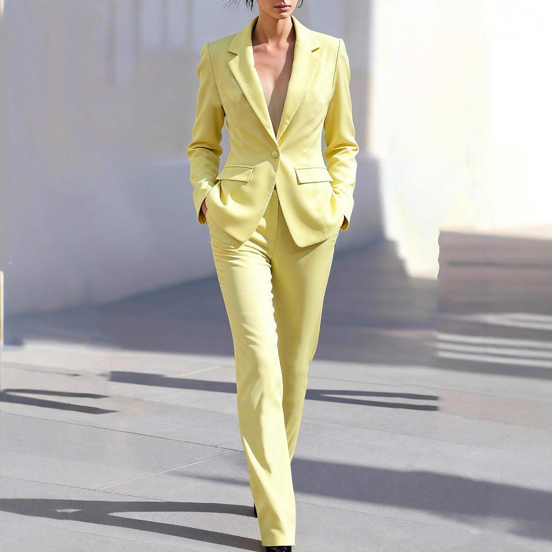 Elegant women's yellow tailored workwear co-ord set with blazer and straight-leg trousers for office attire.