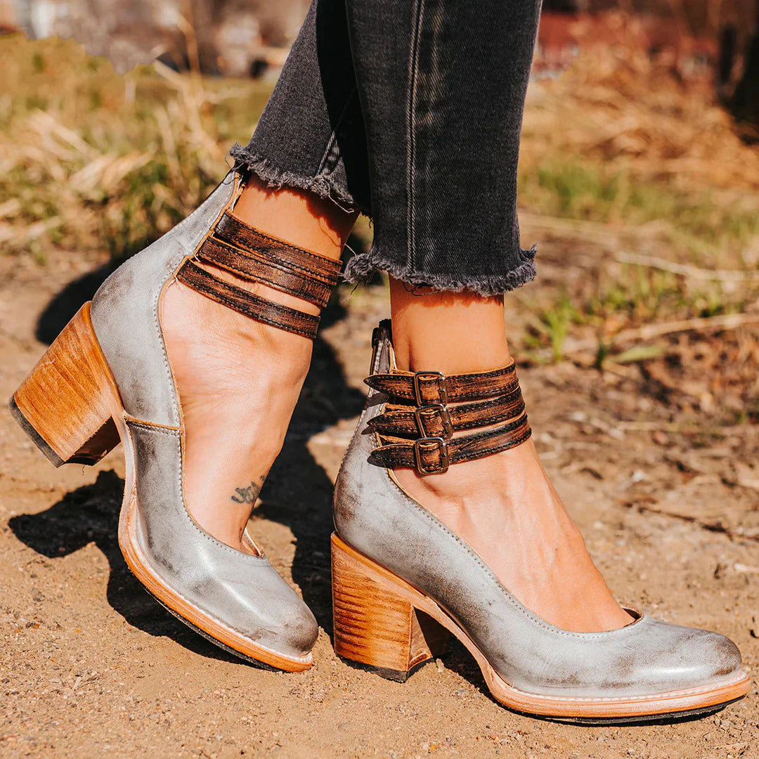 "Elegant women's block heel ankle boots in black, with round toe and back zipper, perfect for chic and comfortable wear."