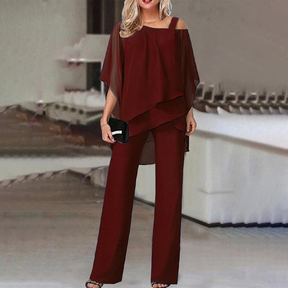 Elegant women's cold shoulder jumpsuit with flowy silhouette, featuring a chic design and flattering fit. Perfect for all occ