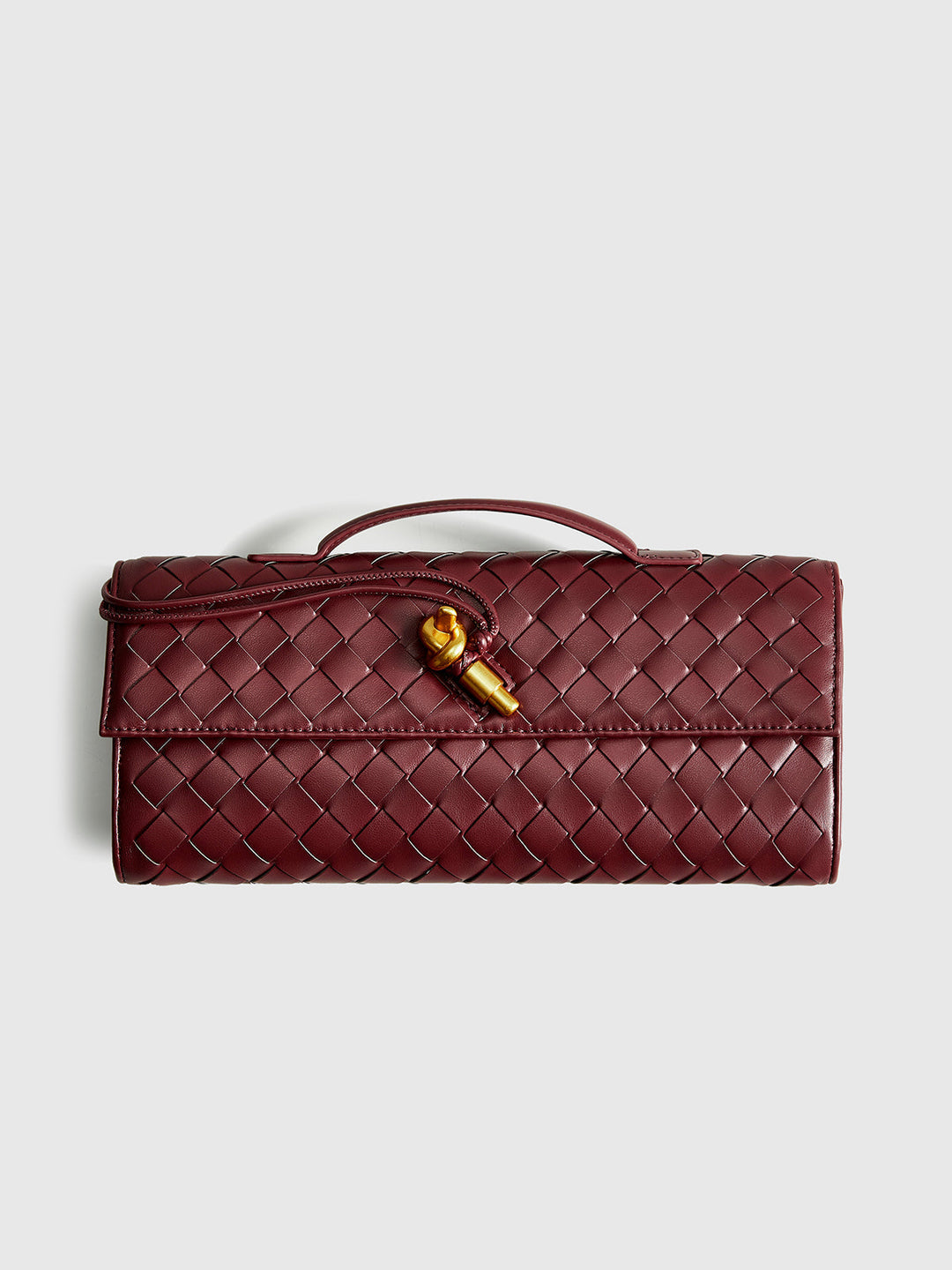 Stylish women's black woven flap clutch, a versatile accessory for any formal event.
