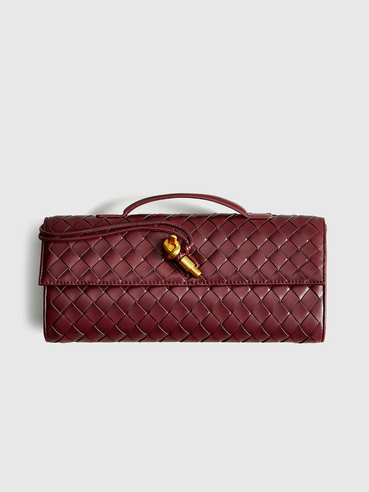 Stylish women's black woven flap clutch, a versatile accessory for any formal event.