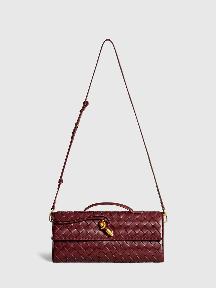 Chic beige woven flap clutch handbag, an essential fashion accessory for modern women.