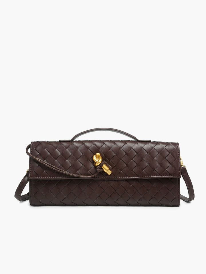 Handheld elegant white woven clutch with a secure flap, enhancing any evening outfit.