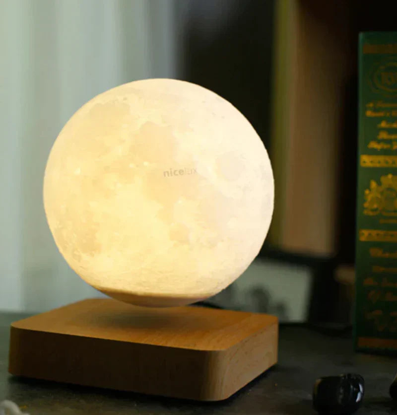 Modern floating moon lamp, LunaFloat, serving as a stylish desk lamp or night light, enhancing any space.