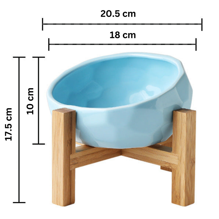 "Ergonomic elevated pet bowl with non-slip wooden stand, sleek design, blue color, enhances pet comfort and posture."