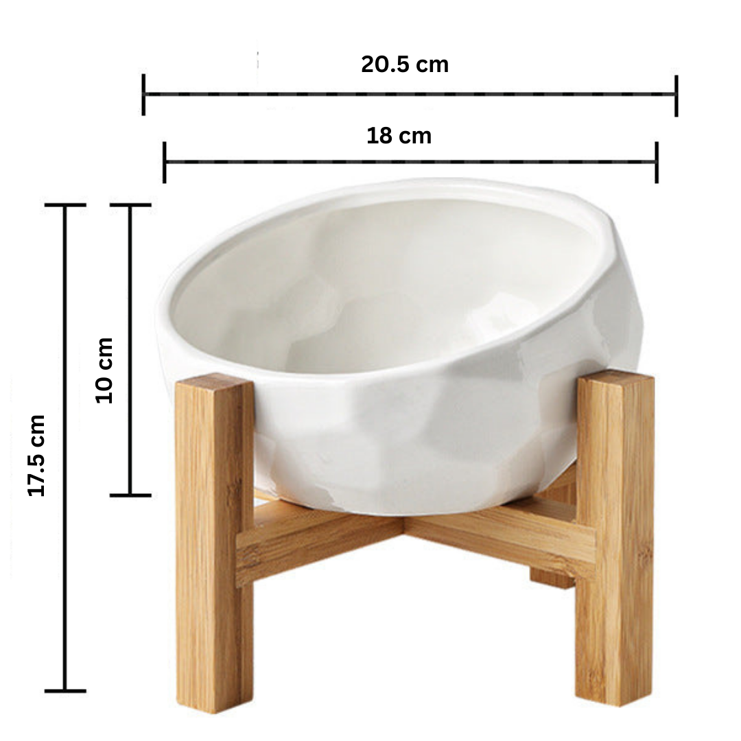 "Ergonomic elevated pet bowl with non-slip wooden stand, sleek design, blue color, enhances pet comfort and posture."