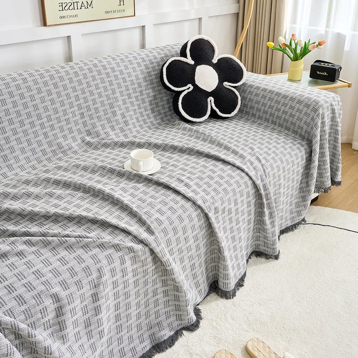 Extra large reversible sofa cover for living room furniture protection. Pet-friendly, machine washable couch cover textile.