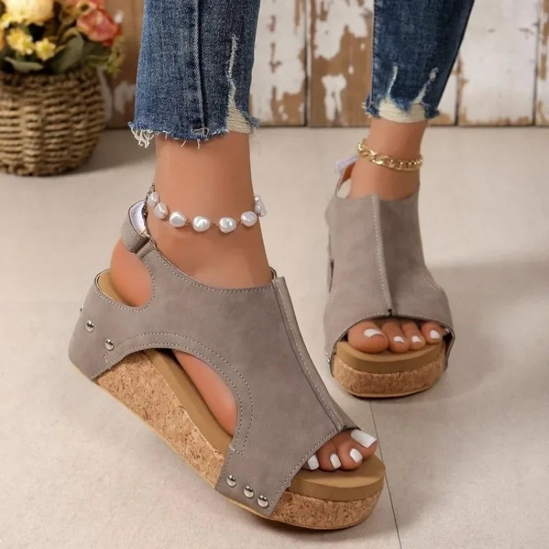 Women's comfortable wedge sandals with a stable, fashionable heel, ideal for stylish spring and summer outfits.
