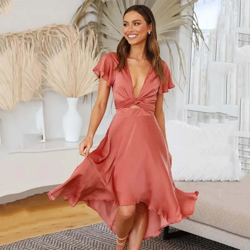 Effortless women's midi wrap dress, viscose blend, short sleeve & flattering fit. Perfect as casual or elegant evening wear.