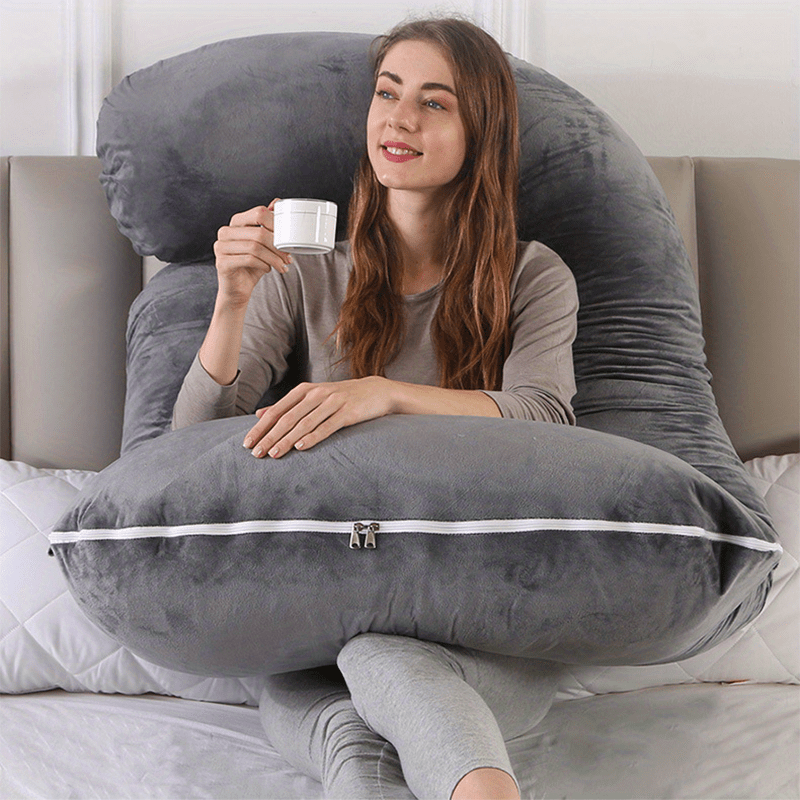 Full body maternity pillow for expecting mothers, providing ultimate pregnancy support & sleeping comfort.